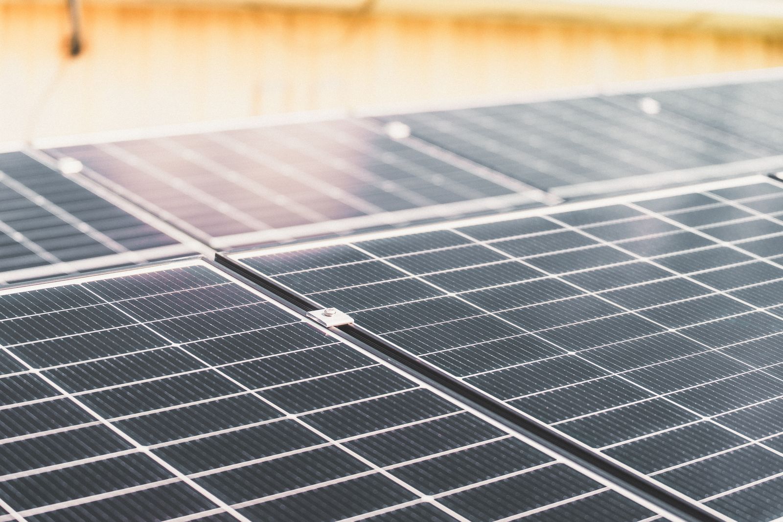 Solar installation engineer inspecting rooftop panels