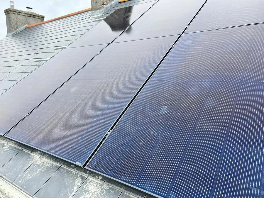 Solar panel installation on a roof near Camborne, Cornwall
